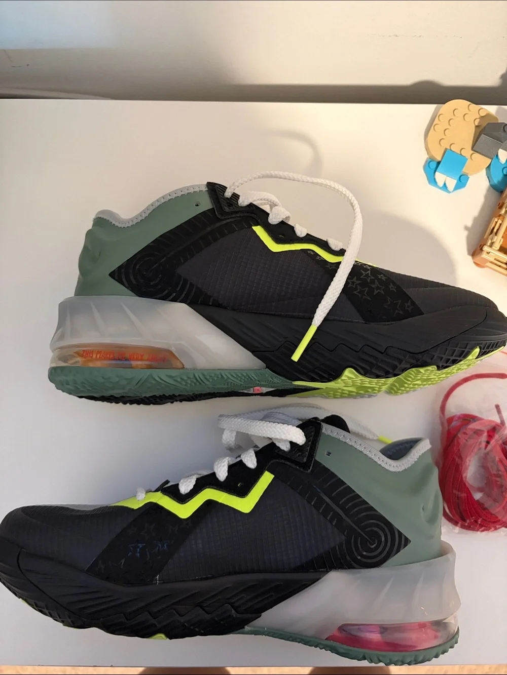 Nike Kids Grey Sneakers with Pink Swoosh and Neon Accents